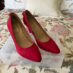 Red suede pumps
